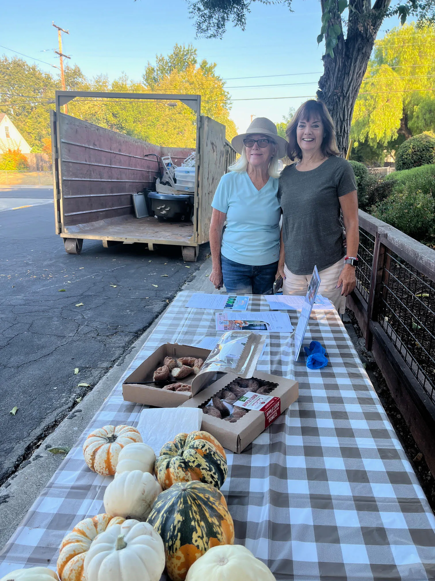 Volunteers helping load a truck during Dumpster Day