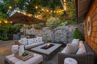 037 - 6 Snowberry Lane - Twilight view of the backyard firepit