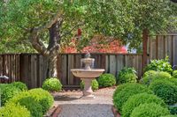 040 - 141 - 6 Snowberry Lane - Bird bath in the middle of a garden