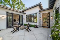 005 - 2990 Limestone Road - Outdoor patio with firepit, seating, Doors are open