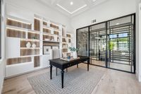 010 - 2990 Limestone Road - Office table and wine room with glass door