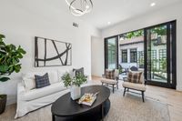 046 - 2990 Limestone Road - Family room and open door that shows backyard patio