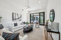 045 - 2990 Limestone Road - Family room and open glass door that leads outside