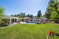 032 - 19 Warwick Court - Large level lawn and view of the house