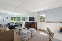 38 - 72 Davis Road - Family room and door that leads outdoor