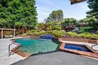 56 - 214 - 3369 Stage Coach Drive - Swimming pool and landscaped garden