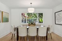 09 - 1245 Rimer Drive - Dining table and glass window