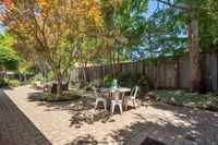 13 - 1245 Rimer Drive - Outdoor with tables, chairs and trees
