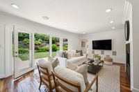 017 - 3190 Bavarian Lane - Family room with slightly open glass door