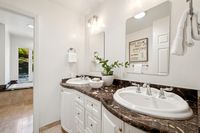 028 - 3190 Bavarian Lane - Bathroom sink with cabinets