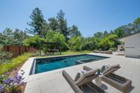 02.5 - 3108 Del Oceano Drive - Swimming pool area with 2 lounge chairs