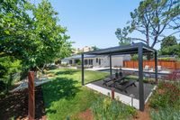 02 - 82 - 3108 Del Oceano Drive -  Backyard with a pergola-covered dining area & Pool