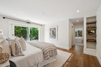24 - 3108 Del Oceano Drive - Primary bedroom with shelves and bathroom
