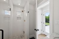34 - 3108 Del Oceano Drive - Shower area and white tiles and paint