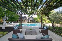 21 - 150 - 25 Haciendas Road - Outdoor patio and swmiing pool area