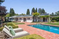 21 - 31 Old Millstone Lane - Swimmiong pool area with 2 lounge chairs