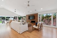 007 - 3165 Lucas Drive - Living room area and large glass windows