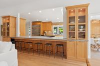 014 - 3165 Lucas Drive - Kitchen  and center island with bar stools