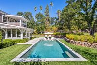 023 - 105 - 2116 Stewart Avenue - Swimming pool surrounded by luscious trees