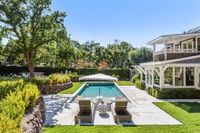 042 - 102 - 2116 Stewart Avenue - Backyard swimming pool with lounge chairs, and umbrella