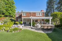 009 - 231 Sundown Terrace - View of the house and landscapped lawn