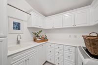 38 - 231 Sundown Terrace - Laundry room with white painted cabinets