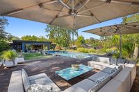 08 - 840 Broadmoor Court - Outdoor space with a pool, deck, and seating area.