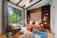 31 - 840 Broadmoor Court - bedroom sitting area with large sliding doors and garden view.