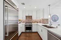 4 _ 1000-dewing-ave-214-modern-kitchen-with-stainless-appliances.jpg