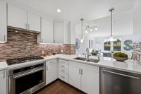 6 _ 1000-dewing-ave-214-kitchen-open-to-living-and-dining-room