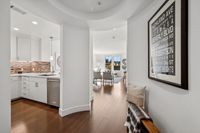 3 _ 1000-dewing-ave-214-entry-hallway-to-kitchen-and-living-room.jpg