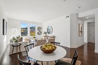 10 _ 1000-dewing-ave-214-dining-table-and-living-room-windows