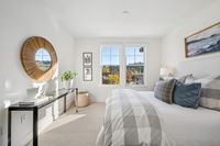 12 _ 1000-dewing-ave-214-primary-bedroom-console-and-round-mirror