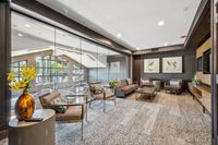 21 _ 1000-dewing-ave-214-resident-lounge-with-glass-wall