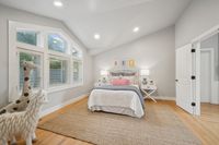 20 _ 849 Sibert Court _ Bright bedroom with large windows, neutral tones, and cozy furnishings