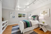 22 _ 849 Sibert Court _ Bright bedroom with modern decor, neutral tones, and track lighting