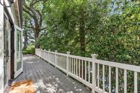 27 _ 1089 Rahara  Drive _ Deck with railing and trees