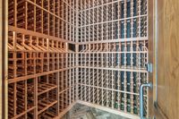 46 _ 1089 Rahara  Drive _ Storage room with built-in shelving racks and tiled flooring