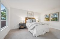 32 _ 665 Sky Hy Circle _ Bedroom with carpet flooring and outdoor access window views
