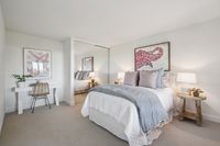 30 _ 665 Sky Hy Circle _ Bedroom with mirrored closet doors and built-in desk area