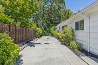 33 _ 4 Crest Road _ Side yard with paved path and fence line access