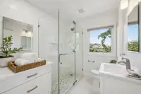 18 _ 996 Hawthorn Drive  _ Bathroom with glass-enclosed shower and single vanity