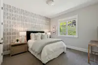 21 _ 31 Sandy Court _ Bedroom with window overlooking the landscaped grounds