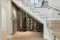 27 _ 31 Sandy Court _ Glass-enclosed wine storage beneath the staircase
