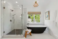 32 _ 31 Sandy Court _ Bathroom with tub and shower