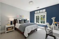 33 _ 31 Sandy Court _ Bedroom with blue accent wall