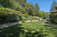 41 _ 31 Sandy Court _ Spacious backyard with hot tub and landscaped garden
