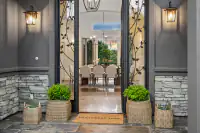 6 _ 21 Nemea Lane _ Decorative front entrance with views into the dining area