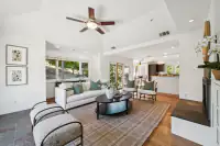 24 _ 21 Nemea Lane _ Living area with fireplace and kitchen access