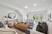 33 _ 21 Nemea Lane _ Bonus room with seating area and French doors to the backyard